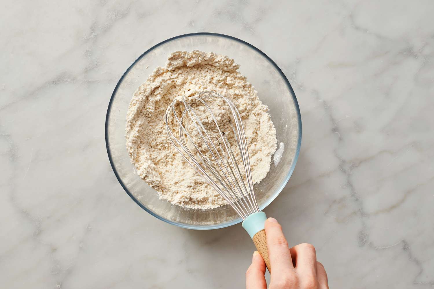 easy basic pancakes whisking flour