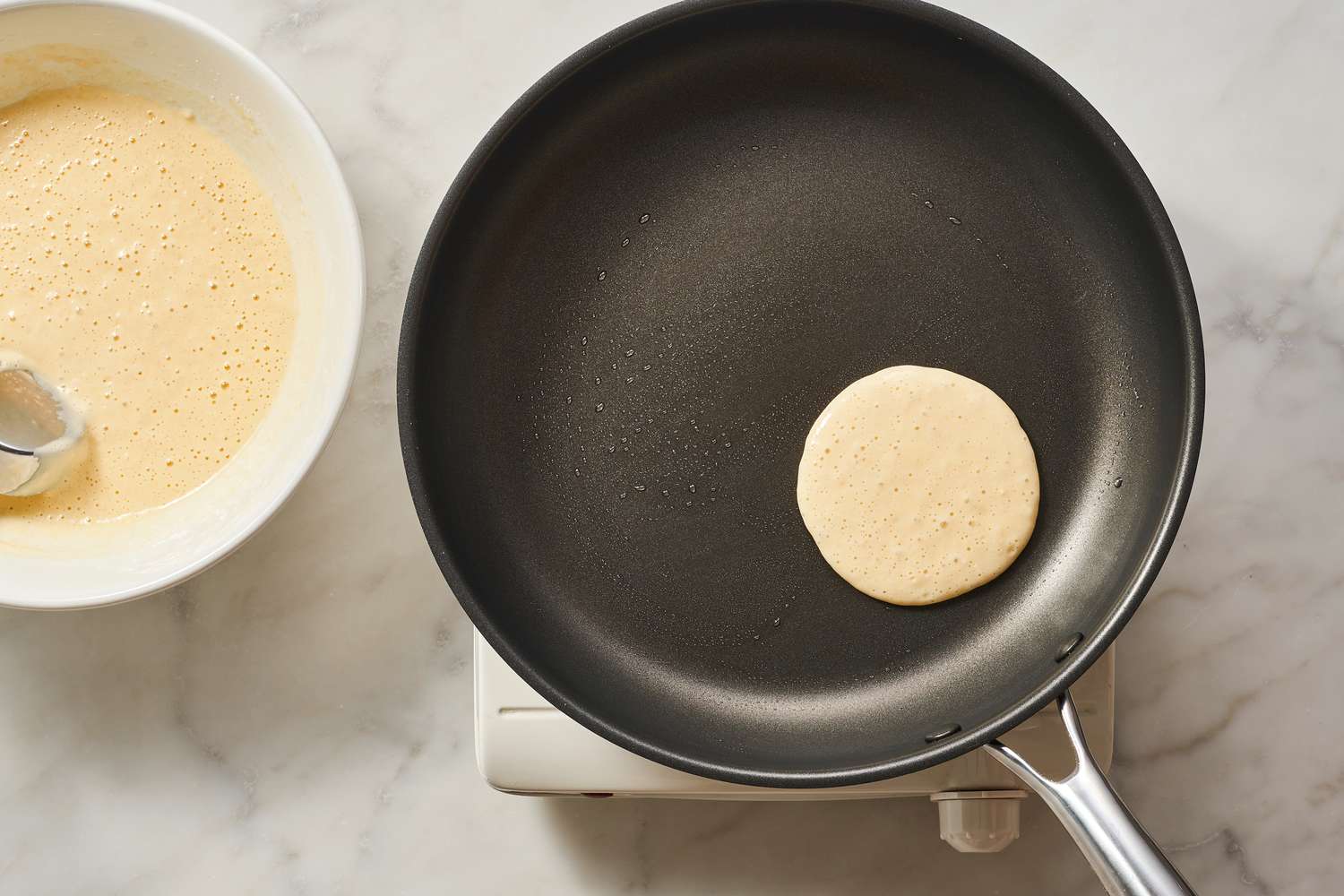 cooking first pancake for easy basic pancakes recipe