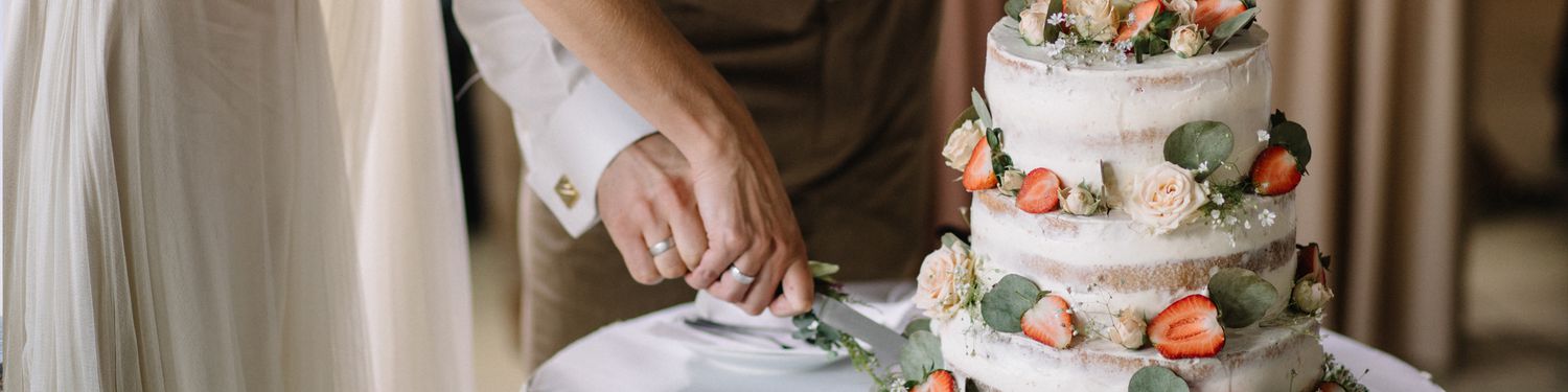 weddings banner - couple cutting cake