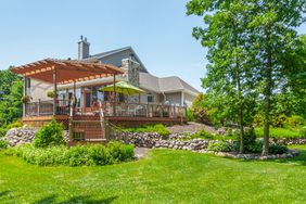 beautiful landscaped backyard sunny day