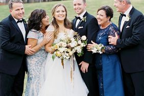 brittany alex wedding couple with parents