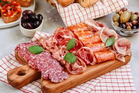 Charcuterie board with salami, prosciutto, and more. 