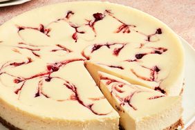 round cranberry cheesecake with slice cut