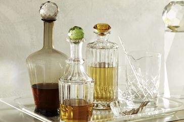 Colorful decanters on a bar