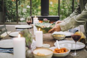 placing salad on table