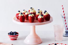 filled strawberries on cake platter