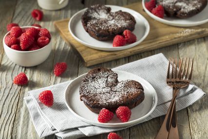 Heart shaped brownies with raspberries