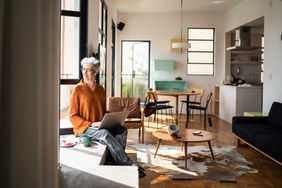 Older woman sitting by window