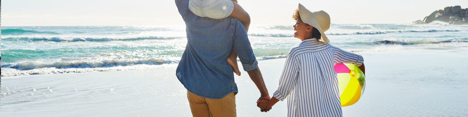 Health and Wellness banner - family on the beach