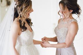 A Mother Helping Her Daughter with Her Wedding Jewelry