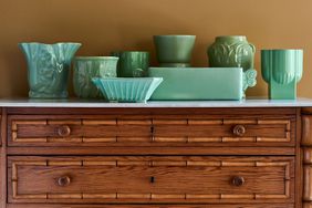 Thrifted planters on a wooden dresser