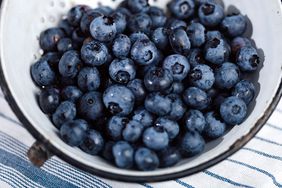 Blueberries in colander freshly washed 