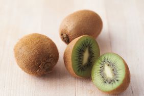 kiwi fruits on surface