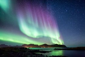 Northern lights over mountains