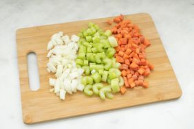 Chopped vegetables on a bamboo cutting board