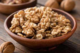 Walnuts in brown bowl