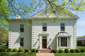 white painted brick home exterior 