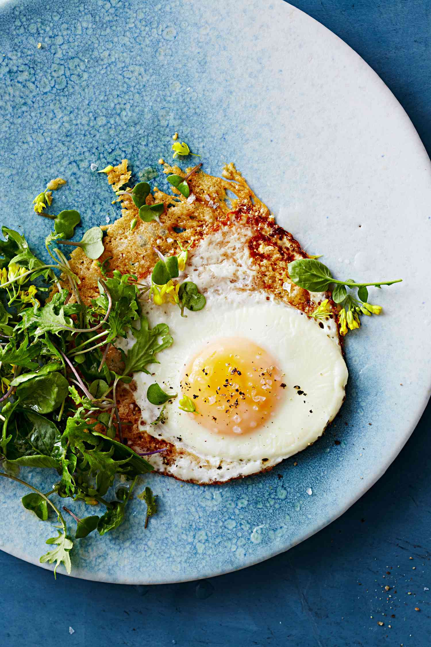 parmesan fried eggs with bitter greens