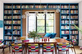 colorful blue Pittsburgh home tour dining room with window