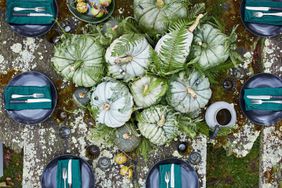 green pumpkin centerpiece on a table