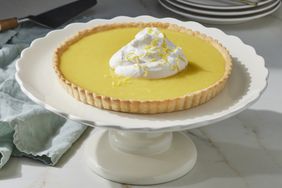 lemon tart on a cake stand