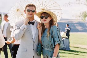 summer wedding guests umbrella