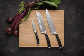 Kitchen Knives Set on Wood Cutting Board