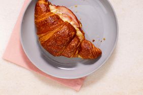 twice-baked ham croissant served on a gray plate