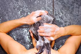 senior woman washing hair