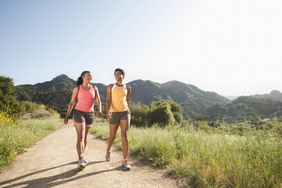 women walking on trail