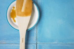 wooden spatula used with brown gravy