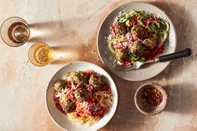 bowls of spaghetti squash and zucchini noodles with zucchini meatballs